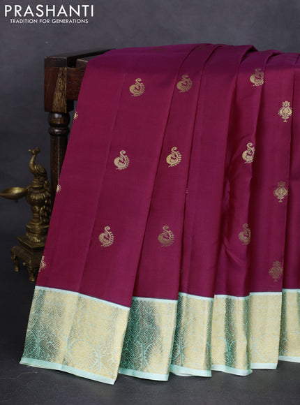 Pure kanchipuram silk saree dark magenta pink and green shade with zari woven buttas and zari woven korvai border