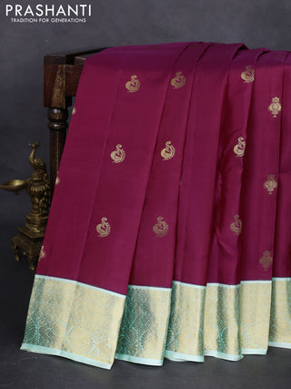 Pure kanchipuram silk saree dark magenta pink and green shade with zari woven buttas and zari woven korvai border