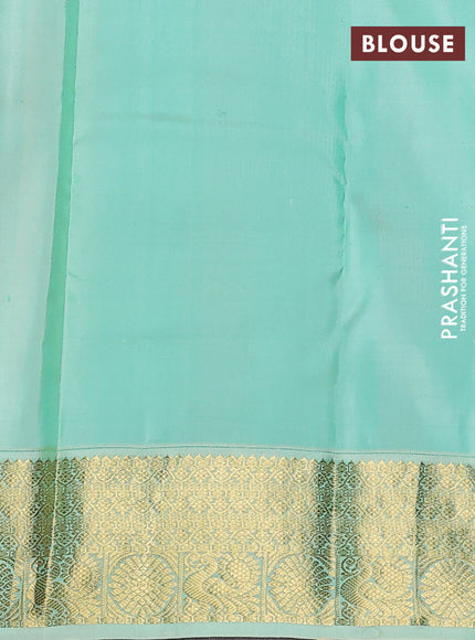 Pure kanchipuram silk saree dual shade of pinkish orange and green shade with zari woven buttas and zari woven korvai border