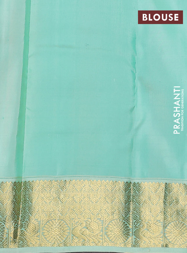 Pure kanchipuram silk saree dual shade of pinkish orange and green shade with zari woven buttas and zari woven korvai border