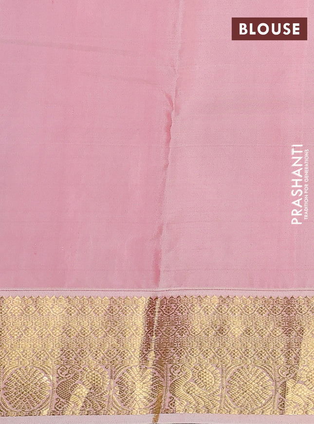 Pure kanchipuram silk saree dual shade of bluish green and peach shade with zari woven buttas and zari woven korvai border