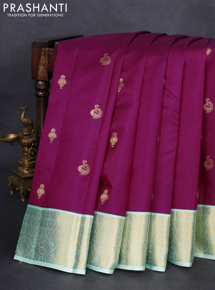 Pure kanchipuram silk saree purple and teal blue with zari woven buttas and zari woven korvai border