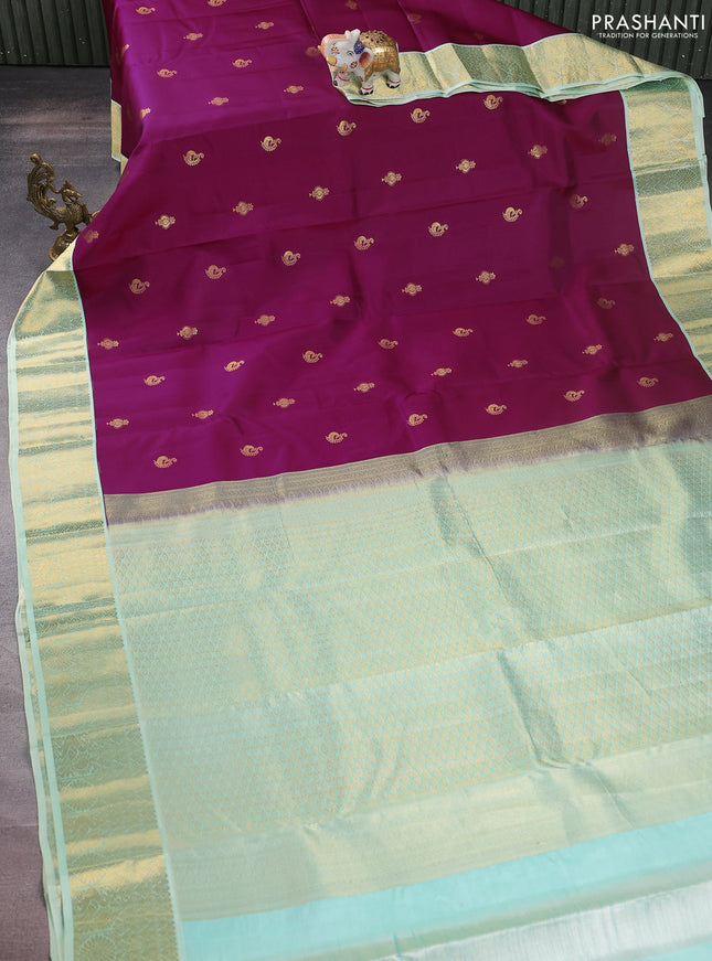Pure kanchipuram silk saree purple and teal blue with zari woven buttas and zari woven korvai border