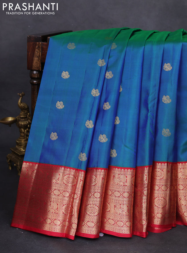 Pure kanchipuram silk saree dual shade of bluish green and maroon with zari woven buttas and zari woven korvai border