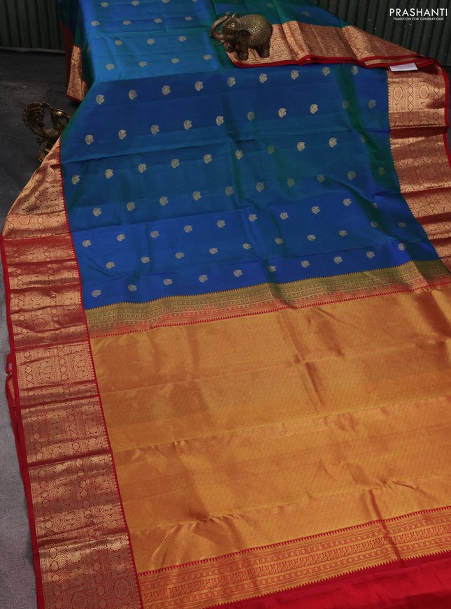 Pure kanchipuram silk saree dual shade of bluish green and maroon with zari woven buttas and zari woven korvai border