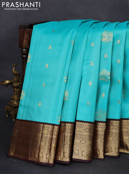 Pure kanchipuram silk saree teal blue and brown with zari woven buttas and zari woven korvai border