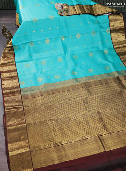 Pure kanchipuram silk saree teal blue and brown with zari woven buttas and zari woven korvai border