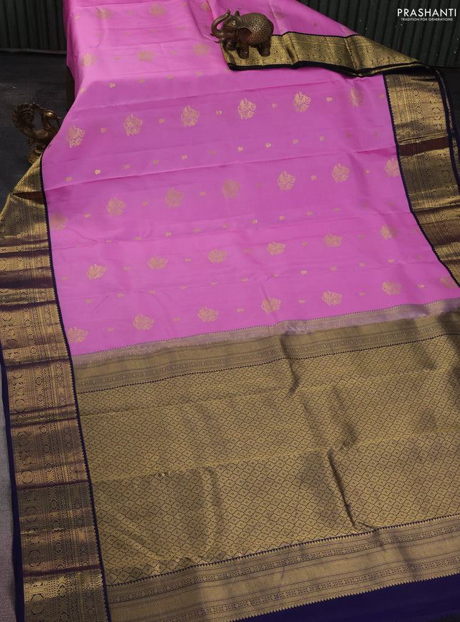 Pure kanchipuram silk saree light pink and navy blue with zari woven buttas and zari woven korvai border