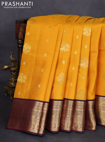 Pure kanchipuram silk saree mustard yellow and wine shade with zari woven buttas and zari woven korvai border