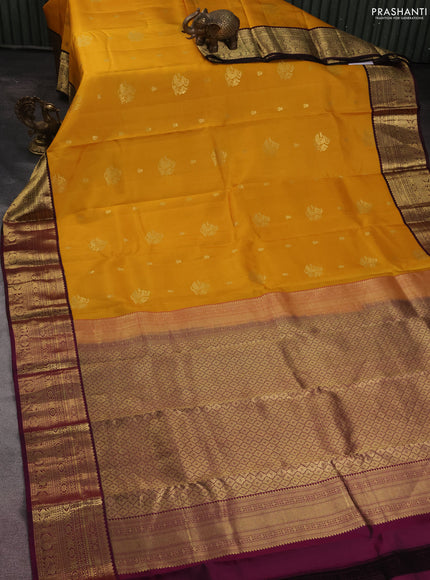 Pure kanchipuram silk saree mustard yellow and wine shade with zari woven buttas and zari woven korvai border