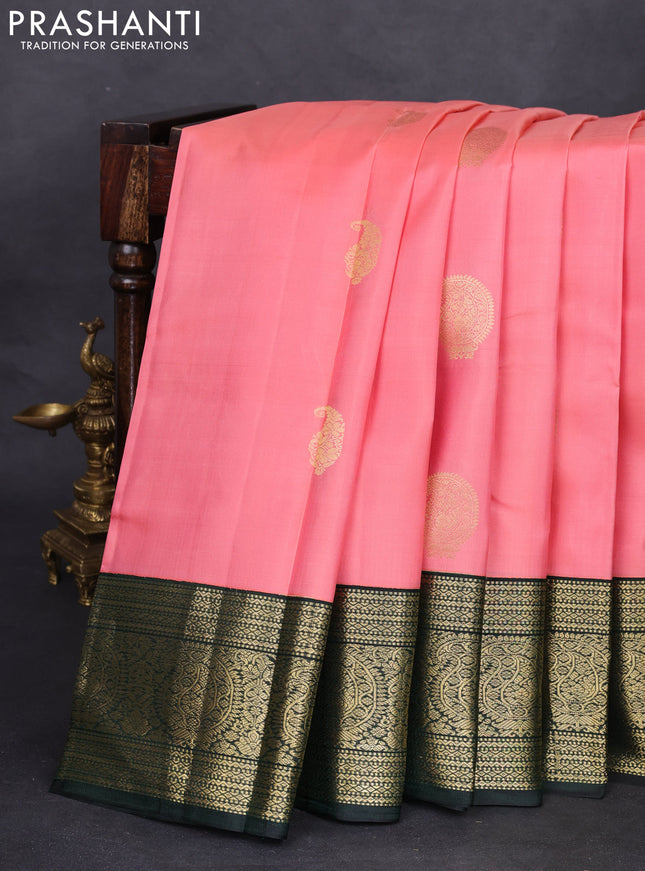 Pure kanchipuram silk saree peach pink and bottle green with zari woven buttas and zari woven korvai border