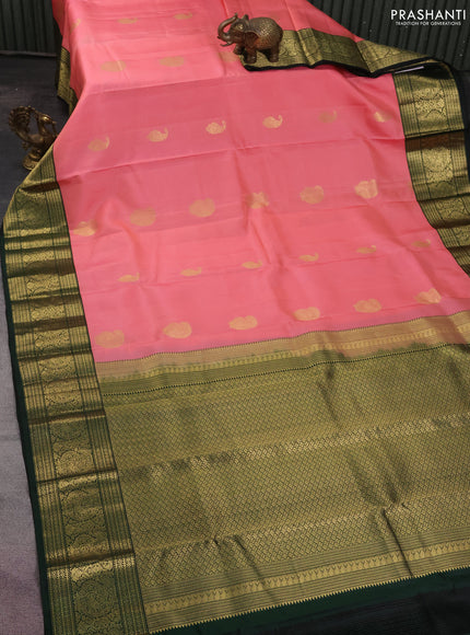 Pure kanchipuram silk saree peach pink and bottle green with zari woven buttas and zari woven korvai border
