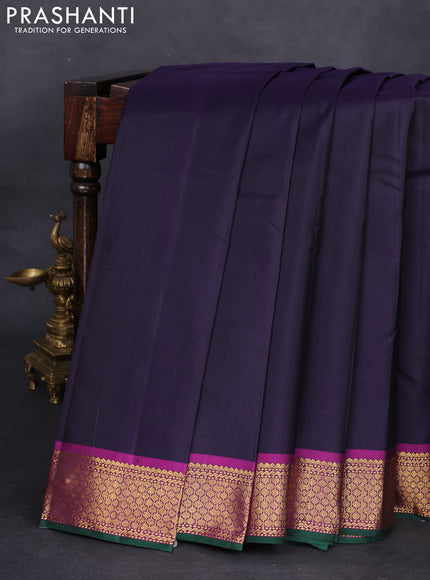 Pure kanchipuram silk saree navy blue and magenta pink with plain body and zari woven border