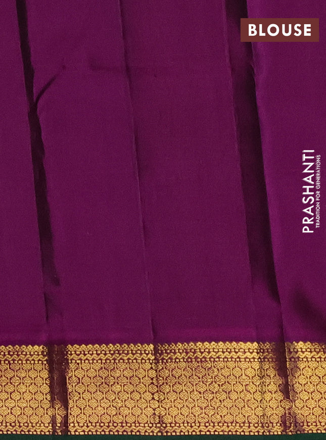 Pure kanchipuram silk saree navy blue and magenta pink with plain body and zari woven border