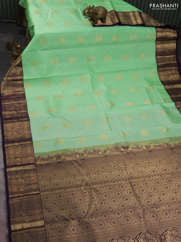 Pure kanchipuram silk saree pista green and deep jamun with zari woven buttas and zari woven korvai border