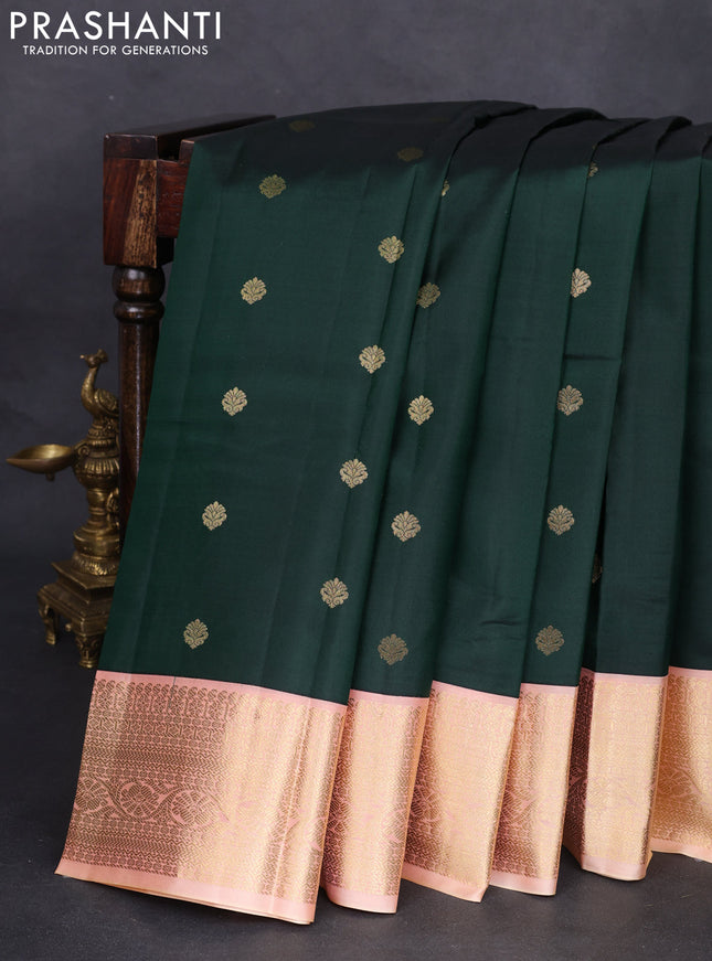 Pure kanchipuram silk saree dark green and peach shade with zari woven buttas and zari woven korvai border