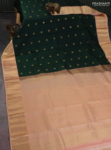 Pure kanchipuram silk saree dark green and peach shade with zari woven buttas and zari woven korvai border