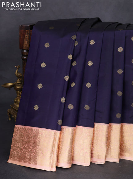 Pure kanchipuram silk saree navy blue and peach shade with zari woven buttas and zari woven korvai border