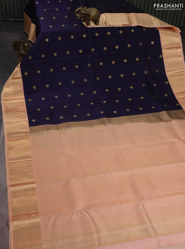 Pure kanchipuram silk saree navy blue and peach shade with zari woven buttas and zari woven korvai border