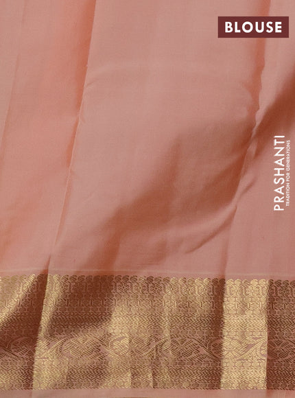 Pure kanchipuram silk saree navy blue and peach shade with zari woven buttas and zari woven korvai border