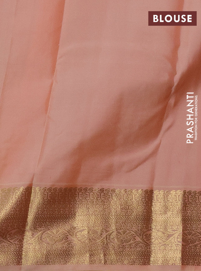 Pure kanchipuram silk saree navy blue and peach shade with zari woven buttas and zari woven korvai border