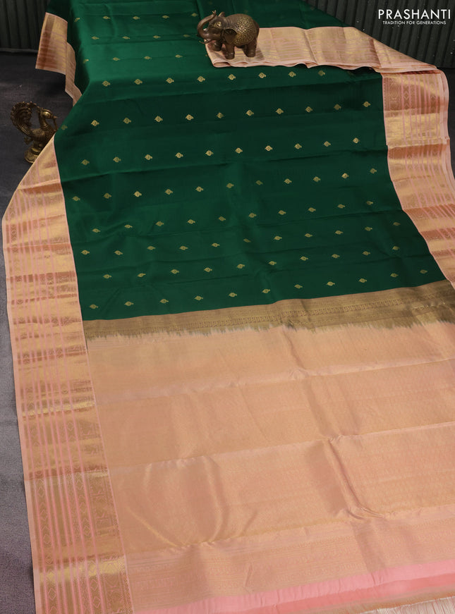 Pure kanchipuram silk saree green and peach shade with zari woven buttas and zari woven korvai border