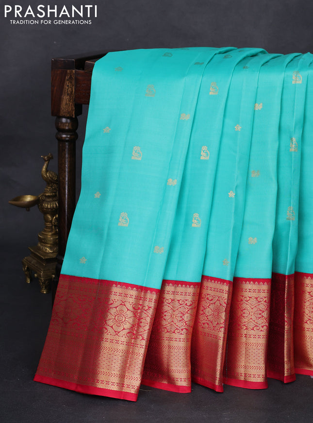 Pure kanchipuram silk saree teal blue and reddish pink with zari woven buttas and zari woven korvai border