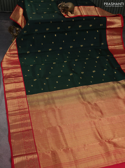 Pure kanchipuram silk saree bottle green and reddish pink with zari woven buttas and zari woven korvai border