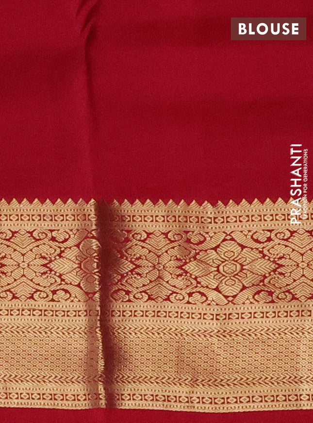 Pure kanchipuram silk saree bottle green and reddish pink with zari woven buttas and zari woven korvai border