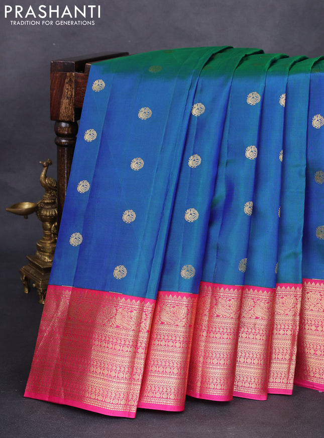 Pure kanchipuram silk saree dual shade of bluish green and pink with zari woven buttas and zari woven korvai border