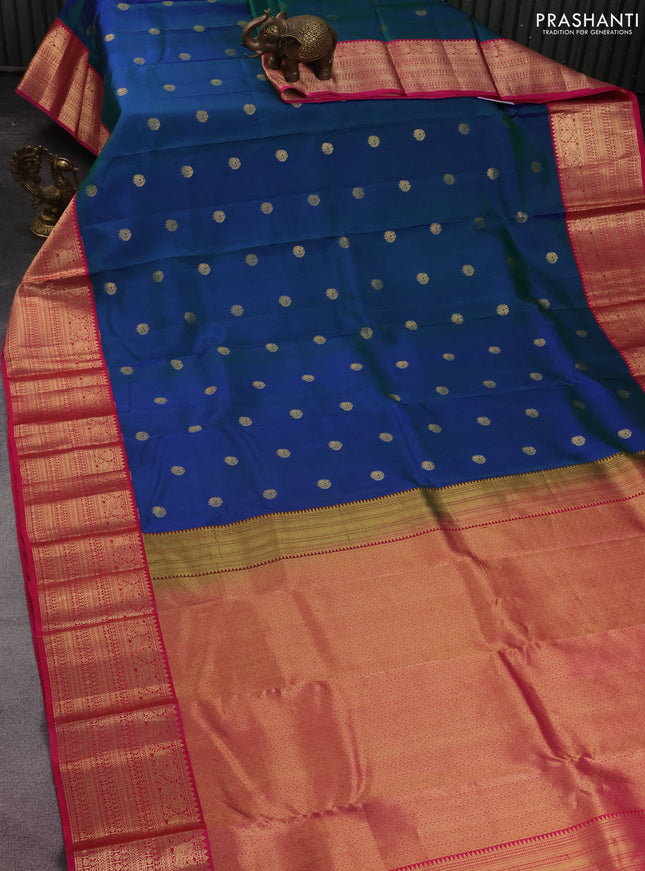 Pure kanchipuram silk saree dual shade of bluish green and pink with zari woven buttas and zari woven korvai border