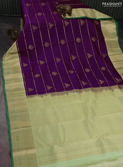 Pure kanchipuram silk saree purple and green with allover zari weaves & buttas and zari woven korvai border