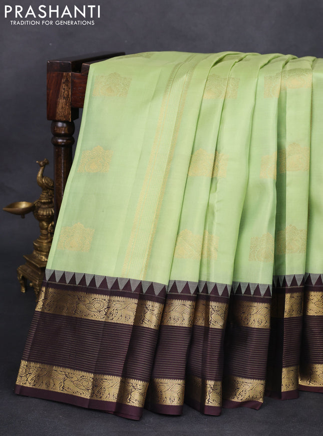 Pure kanchipuram silk saree pista green and brown with allover zari weaves & buttas and zari woven border
