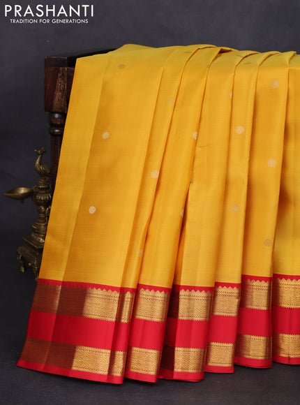 Pure kanchipuram silk saree yellow and red with zari woven buttas and rettapet zari woven korvai border