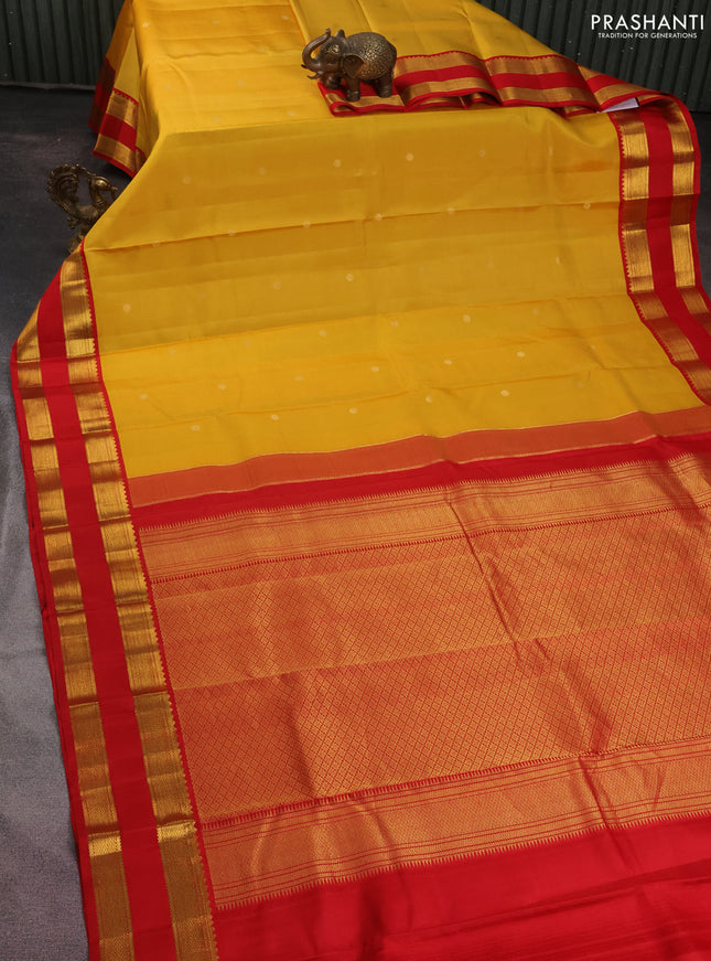 Pure kanchipuram silk saree yellow and red with zari woven buttas and rettapet zari woven korvai border