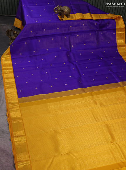 Pure kanchipuram silk saree blue and mustard yellow with allover zari weaves & buttas and zari woven korvai border