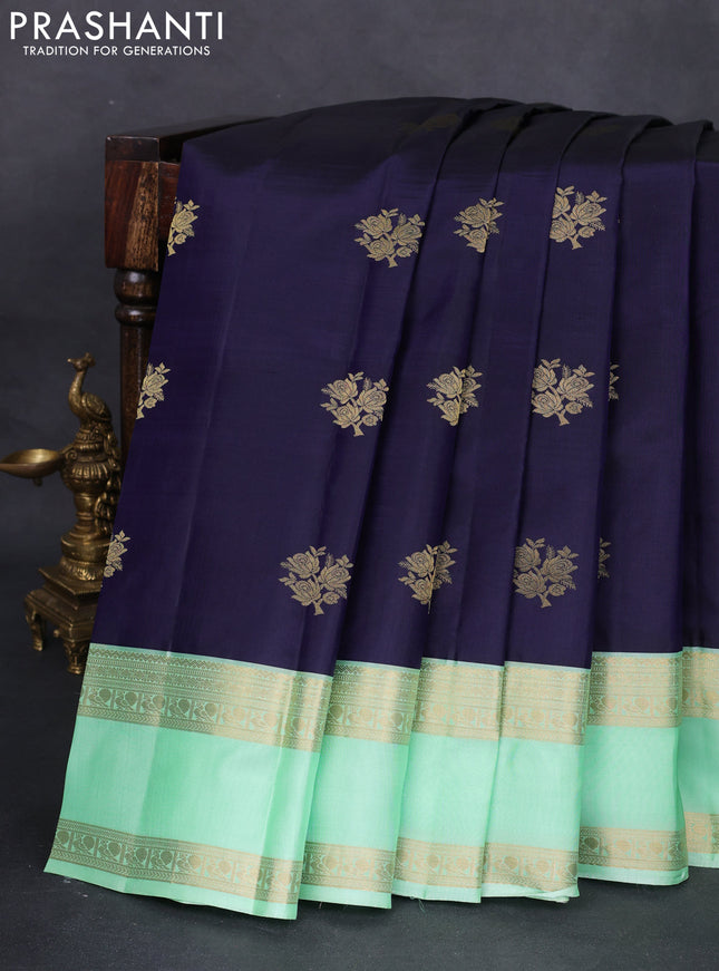 Pure kanchipuram silk saree navy blue and pista green with zari woven buttas and rettapet zari woven korvai border
