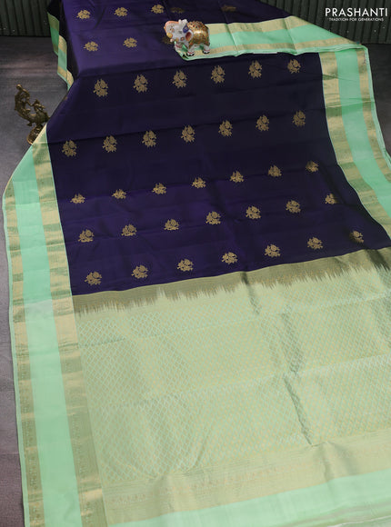 Pure kanchipuram silk saree navy blue and pista green with zari woven buttas and rettapet zari woven korvai border