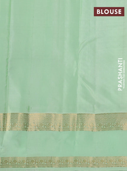 Pure kanchipuram silk saree navy blue and pista green with zari woven buttas and rettapet zari woven korvai border