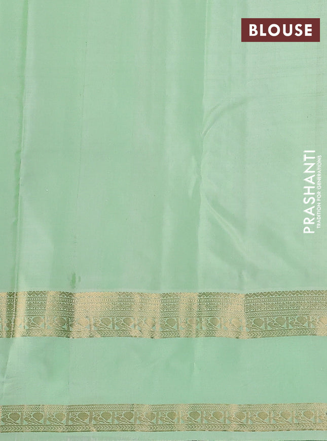 Pure kanchipuram silk saree navy blue and pista green with zari woven buttas and rettapet zari woven korvai border