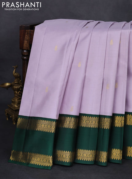 Pure kanchipuram silk saree pastel lavender and green with allover zari weaves & buttas and rettapet zari woven korvai border