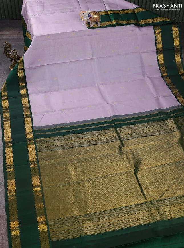 Pure kanchipuram silk saree pastel lavender and green with allover zari weaves & buttas and rettapet zari woven korvai border