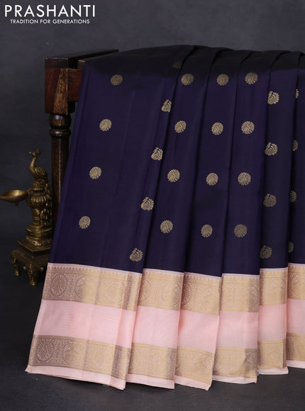 Pure kanchipuram silk saree navy blue and peach shade with zari woven buttas and rettapet zari woven korvai border