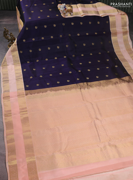 Pure kanchipuram silk saree navy blue and peach shade with zari woven buttas and rettapet zari woven korvai border