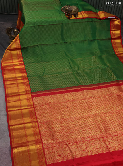 Pure kanchipuram silk saree green and red with allover zari checks and zari woven korvai border