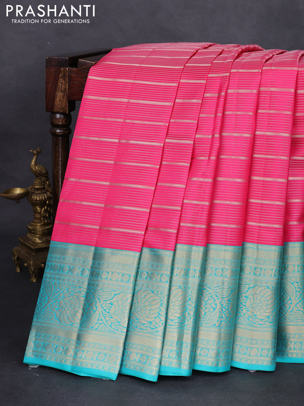 Pure kanchipuram silk saree pink and teal green with allover zari woven stripes pattern and zari woven border