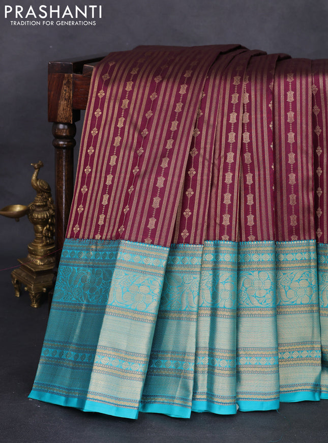 Pure kanchipuram silk saree maroon and teal blue with allover zari woven stripes pattern and zari woven border
