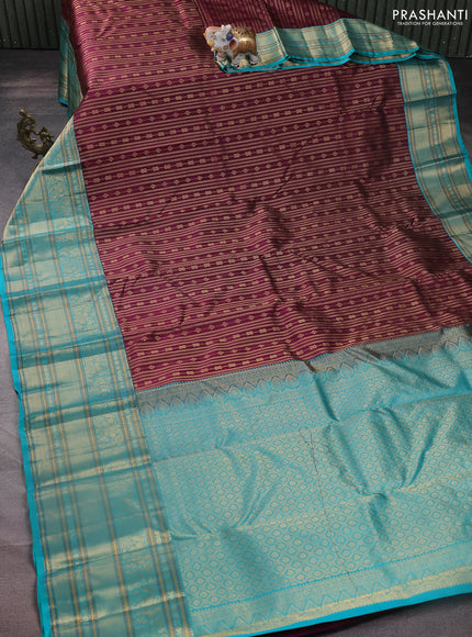 Pure kanchipuram silk saree maroon and teal blue with allover zari woven stripes pattern and zari woven border