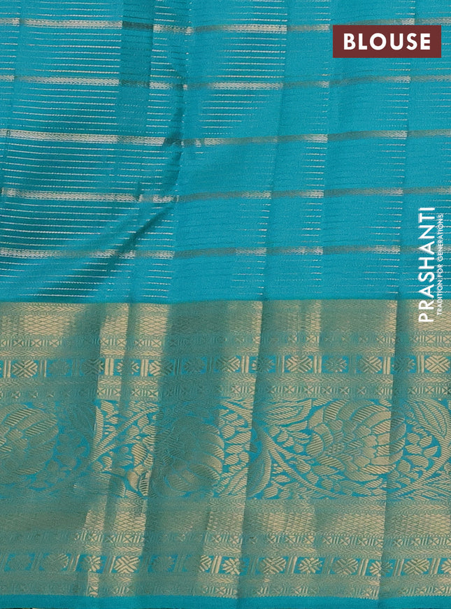 Pure kanchipuram silk saree peach shade and teal blue with allover zari woven stripes pattern and zari woven border