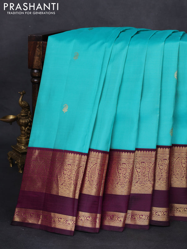 Pure kanchipuram silk saree teal blue and wine shade with zari woven buttas and zari woven korvai border